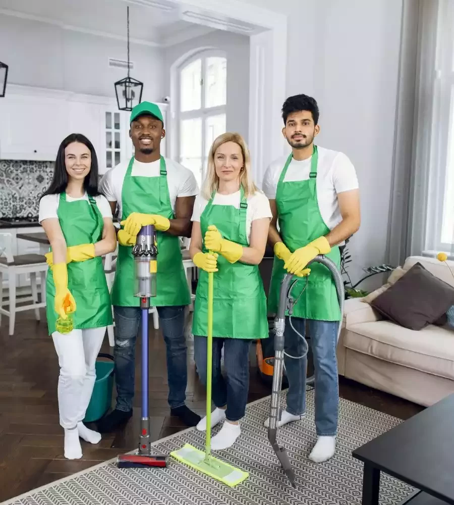 four-multiracial-cleaners-standing-at-modern-apartment-q762d45ixpxym2prq8loc7vi86yishd0vpprc5twr4
